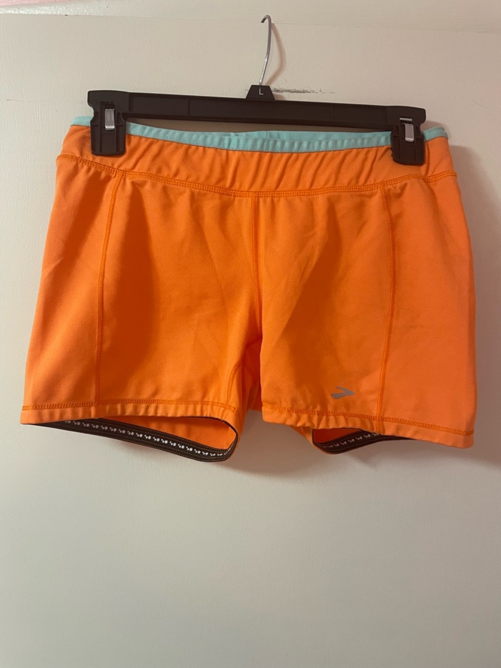 Brooks women’s orange running shorts